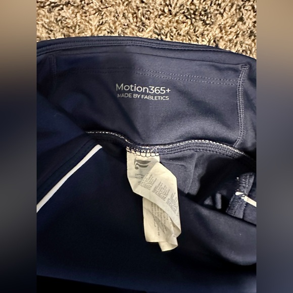 Fabletics Deep Blue Leggings with White Accents - Picture 9 of 10